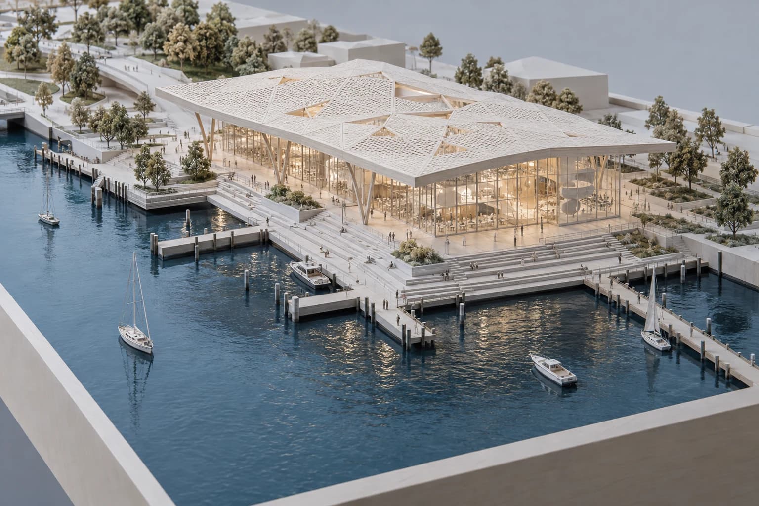 A detailed waterfront development model showing the building, public realm, water access, and surrounding site together